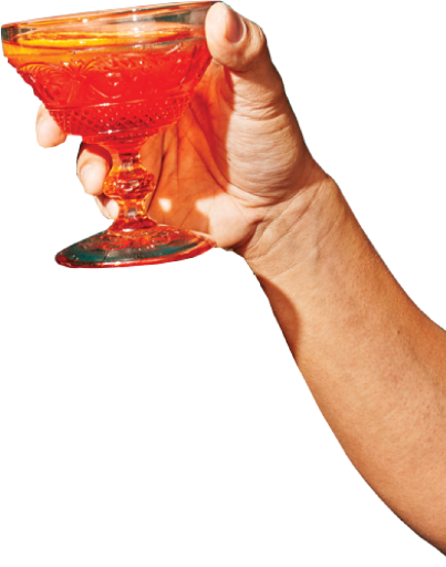 Holding up a glass of Kasama rum
